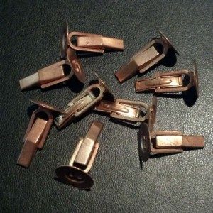 Collection of copper cufflink backs