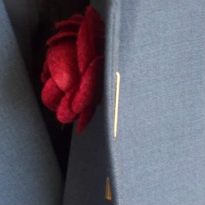Lepel pin attached to suit jacket side view
