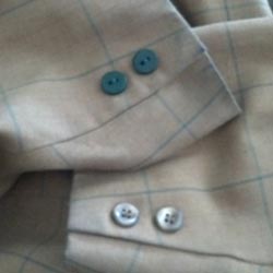 Button on suit sleeve 