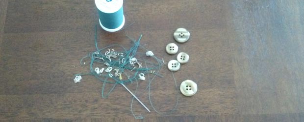 Needle, thread, and buttons