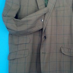 Jacket detail showing ticket pocket and buttons 