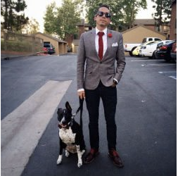Man In Suit Jacket With Dog