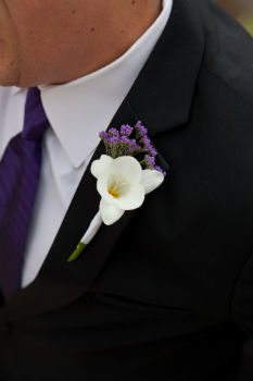 Man wearing white boutonniere
