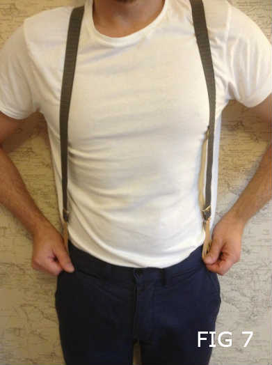 Man Showing Too Wide Braces Position On Trousers 