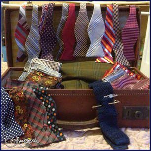 Collection of bow ties in vintage case