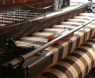 This large loom is housed in the Rhineland Museum of Industry, West Germany.