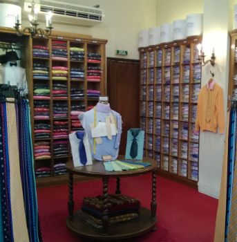 The interior of Hilditch & Key's Paris shop, lined with cubbies.