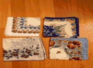 Vintage finds from a thrift store: women's handkerchiefs repurposed as men's pocket squares.