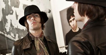 Oasis' Liam Gallagher sporting a Tootal scarf.