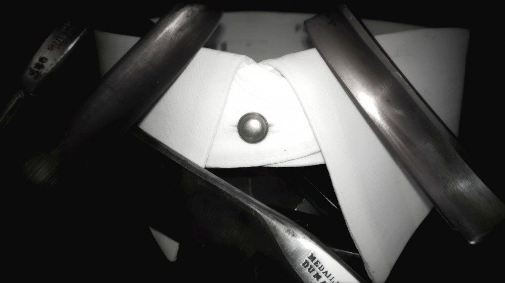 Two vintage cut throat razors 