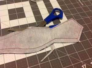 Scissors used to cut seam allowance after sewing