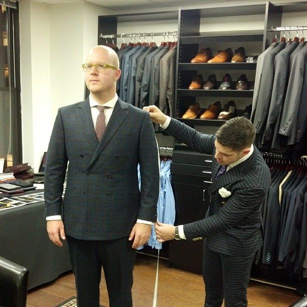 Man getting a custom Holland & Sheery three piece suit tailored