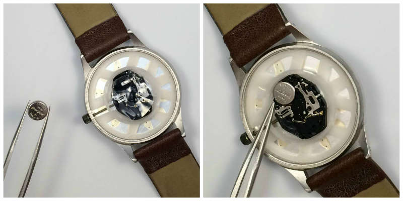 Watch battery being placed into movement