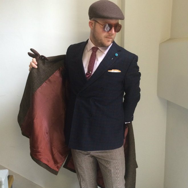 Putting on Harris Tweed overcoat