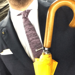 Man holding umbrella