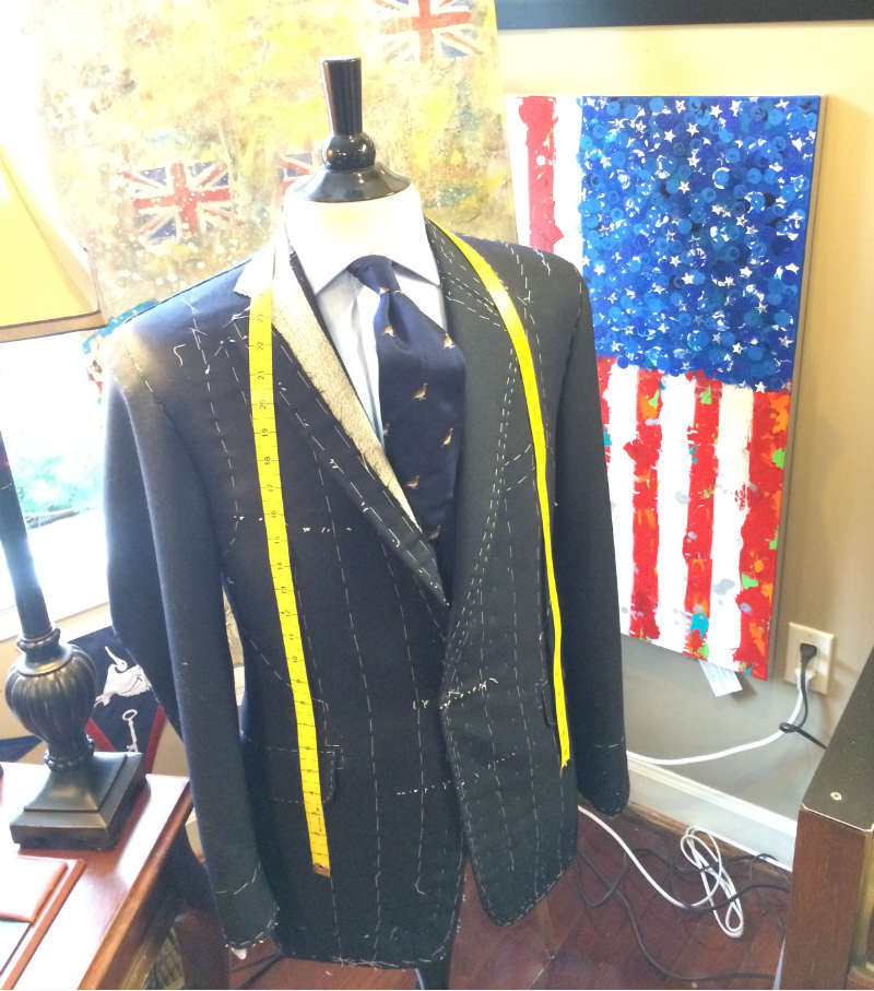 Bespoke suit mid construction with union jack background