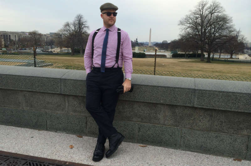 Man wearing suspenders for street style shoot