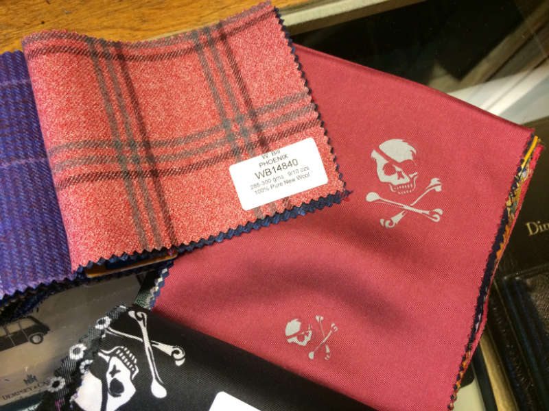 Pink and grey windowpane sports cost fabric swatch