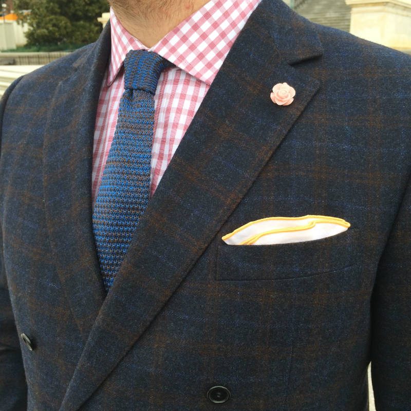 Street style suit details with lapel flower