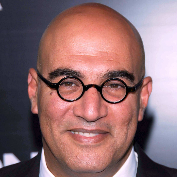 Yigal Naor in round glasses