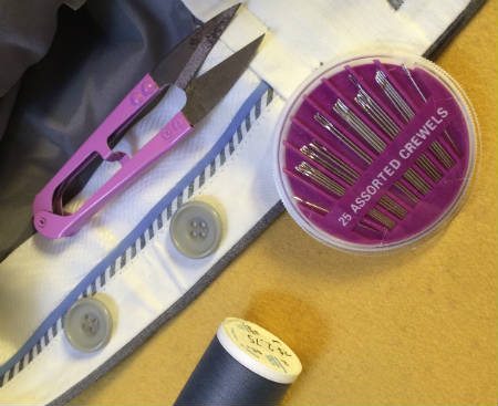 Adding braces buttons to trousers