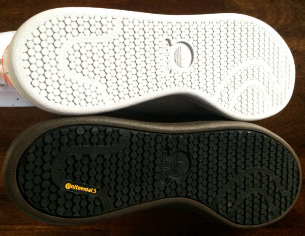 Soles of Stan Smith shoe and boot