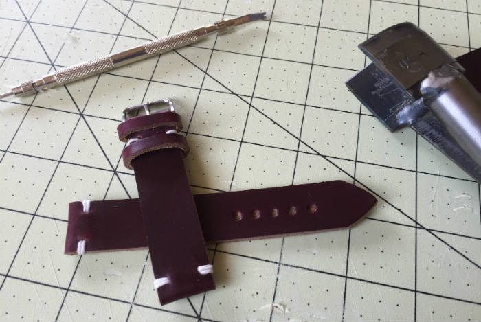 Punching end of watch strap