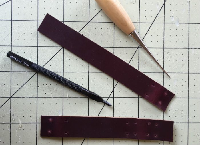 Punching holes in leather for spring bars