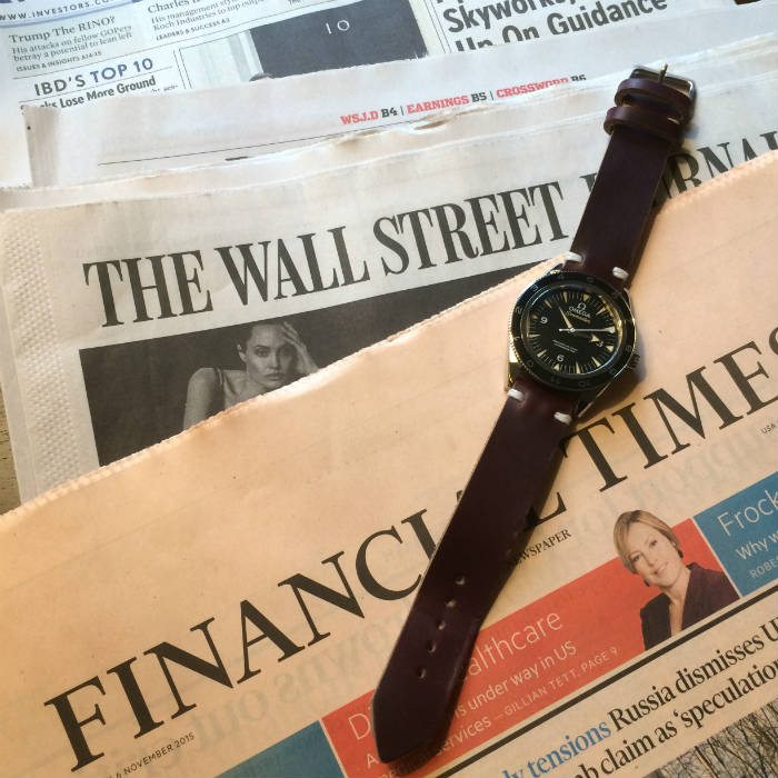 Watch laying on newspapers