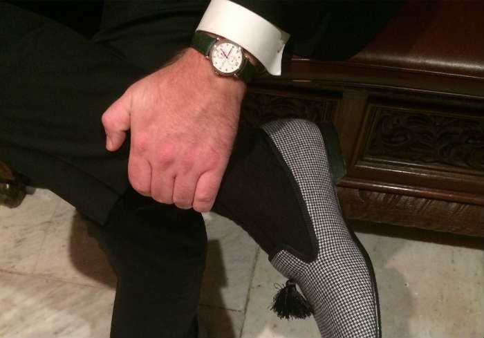 paul anthony wearing wholecut slipper with suit