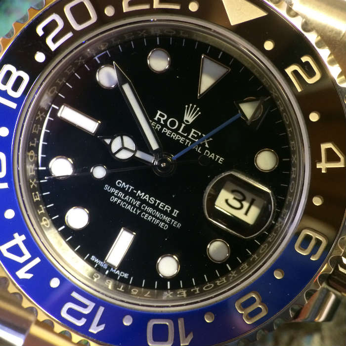 Macro Shot Of Rolex Batman Watch Face