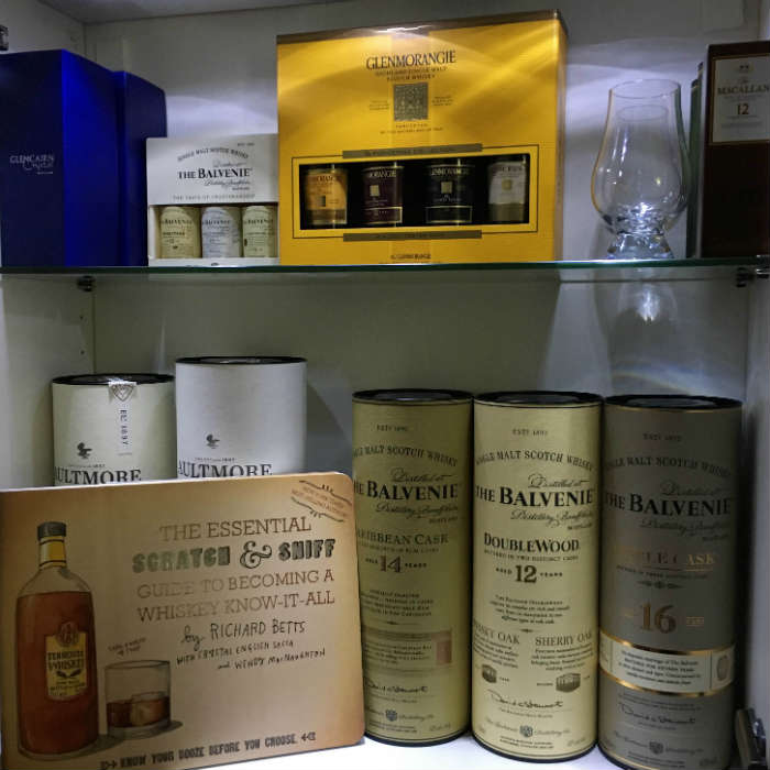 Whisky cabnet with bottles and books