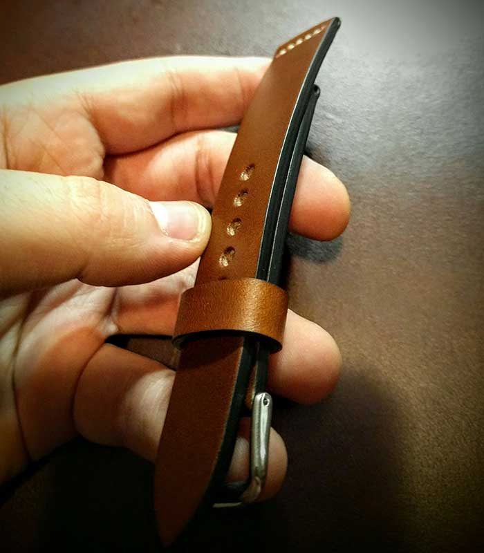 Strap Being Inspected For Perfection