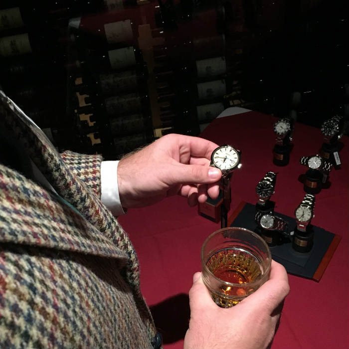 Paul Anthony looking at Grand Seiko watch