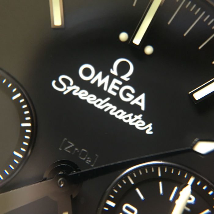 Macro Image Of Omega Speedmaster Face Taxt