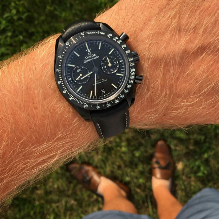 Paul Anthony Looking At Omega Speedmaster On Wrist