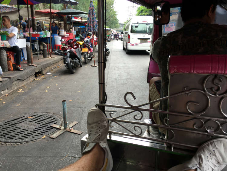 Departing from the market in a tuk tuk