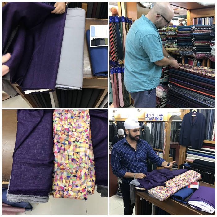 Paul Anthony selecting purple suit fabric