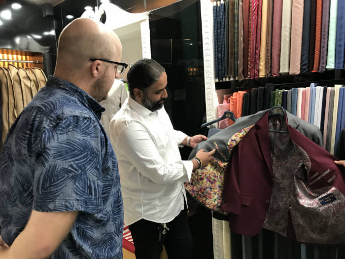 Peter showing Paul Anthony inside pocket suit details