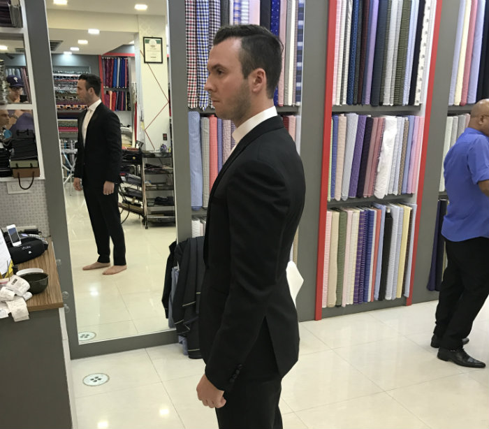 Side view of Trevor Guilday in Tuxedo