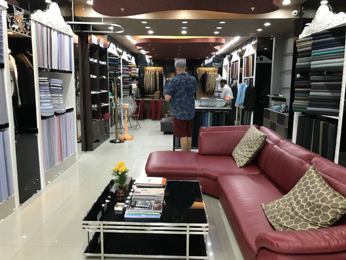 Suit Master shop looking at fabric