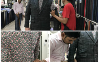 Tailor attaching suit sleeve and darting shirt