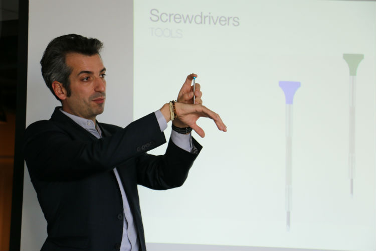 Vincent Robert demonstrating correct use of screwdriver