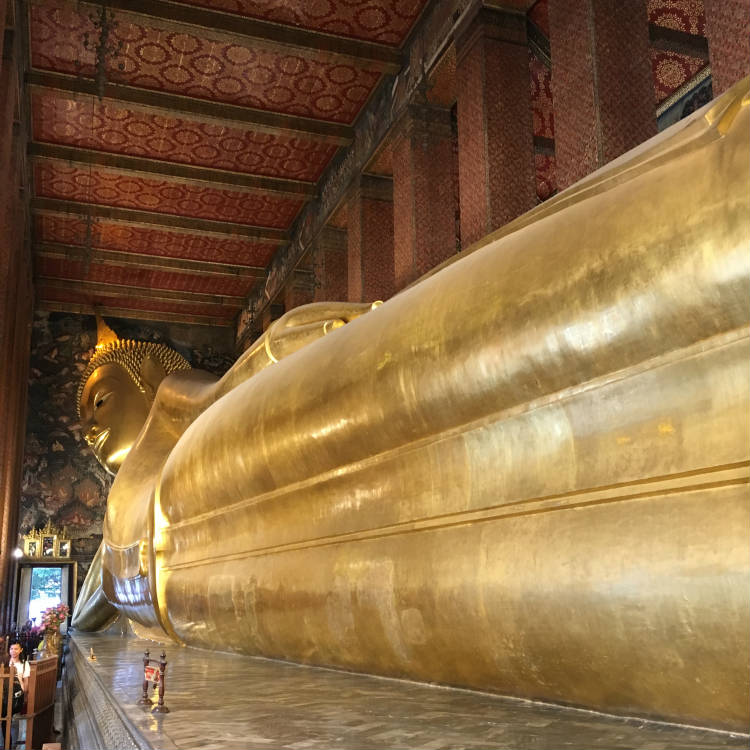Full length shot of reclining Buddha in Wat Pho