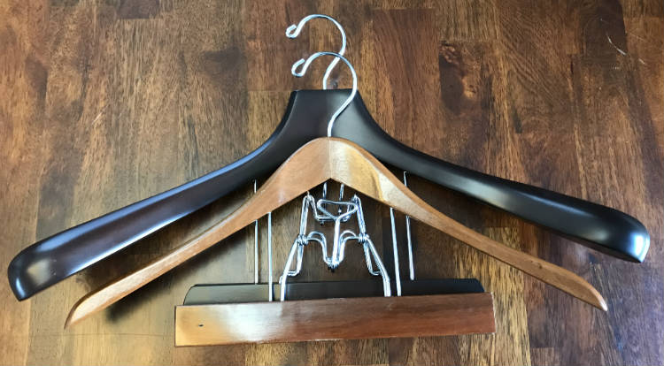 Two clamping suit hangers compared