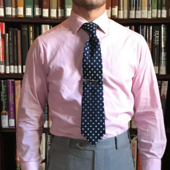 Uneven Shoulder Slopes In Pink Shirt