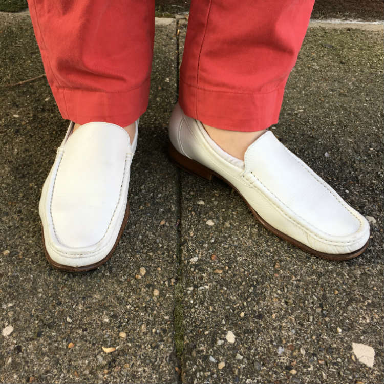 red pants with white loafers