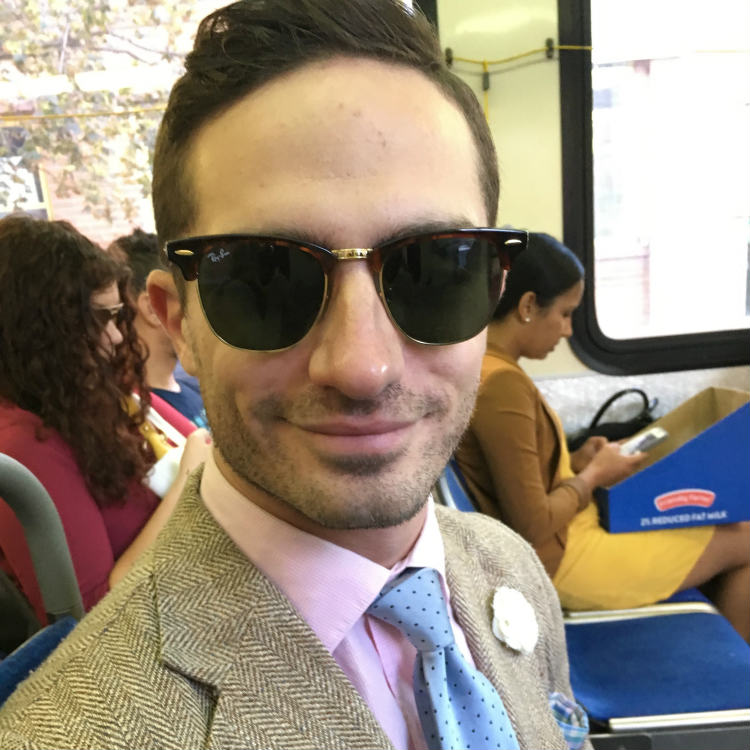 Man In Sunglasses Pink Shirt And Blue Tie