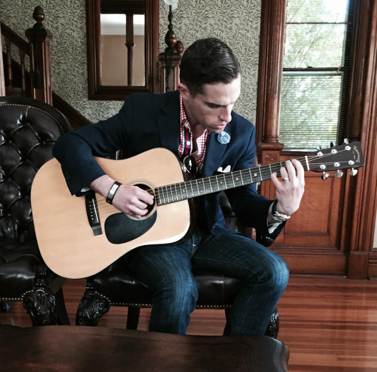 Man Playing Acoustic Guitar