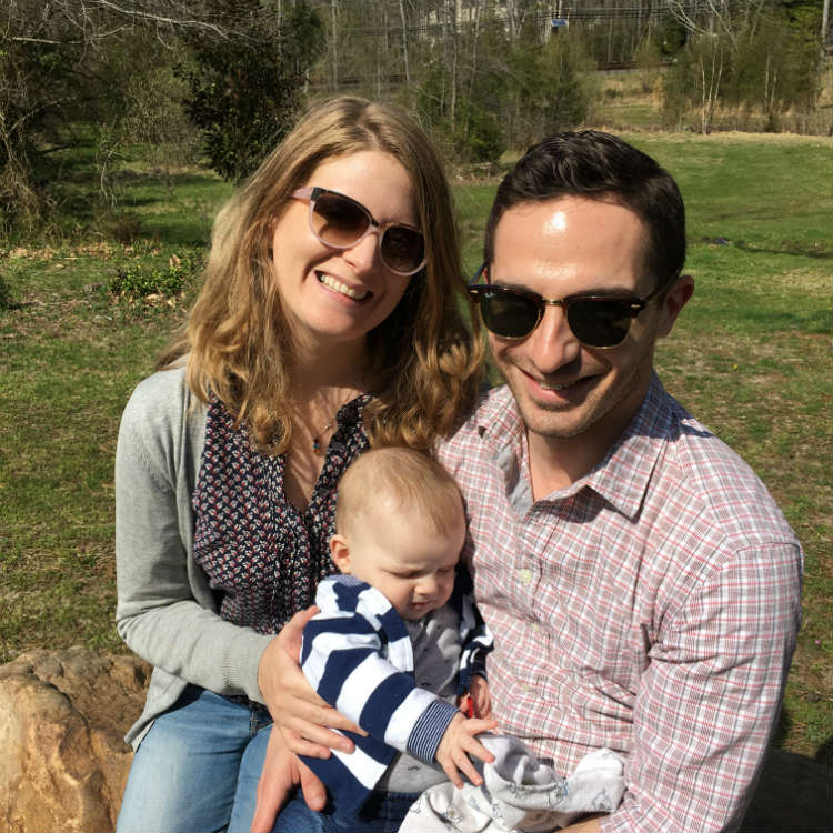 Man Woman And Baby Outside